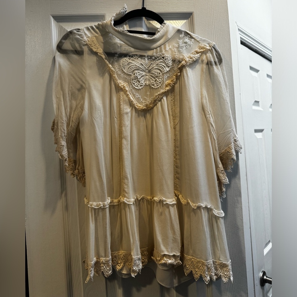 Kate Spade New York Madison Ave butterfly appliqué flounce blouse